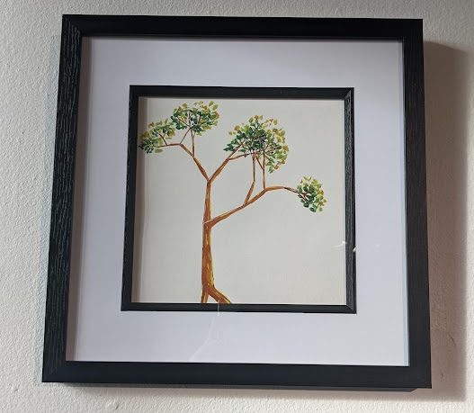 image of a framed minimalist painting of a tree